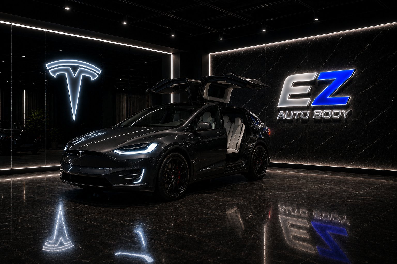Black Tesla Model X with falcon-wing doors open in a dark showroom with neon Tesla and EZ Auto Body logos
